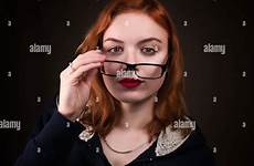 nerd stock girl beautiful alamy young glasses woman eyeglasses vision looking over photography