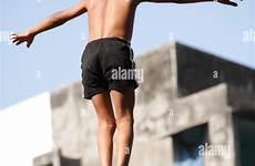 mallakhamb boy balancing pole standing mumbai alamy wooden india