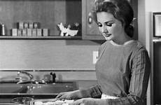 housewife 1960s kitchen woman baking biscuits fine poster