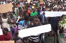 uganda ugandan defend anger unison wailed stripped dozen caption