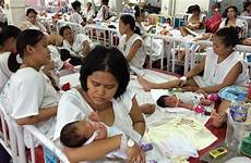 bed hospital ward maternity baby manila factory fabella women babies busy birth giving inside mothers their after public several