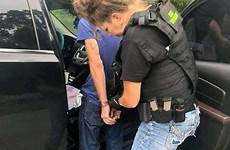 police handcuffed cop female women men escorted