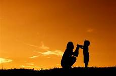 mother son silhouette sunset premium outdoors playing