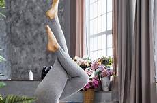 yoga living room practicing woman stock format