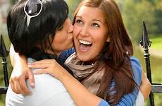 kissing mother daughter her happy outdoors embrace stock dreamstime teen fence