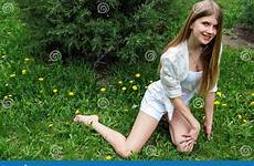 cute girl smiling barefoot posing lawn green stock preview
