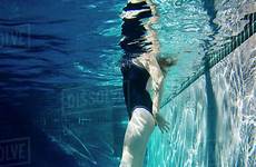 swimming girl underwater pool teenage dissolve stock blend d145