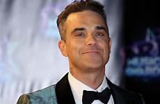 robbie williams mama cass star beg fillers happened fans stop please face aykroyd dan haunted house ibtimes