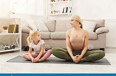 yoga daughter mother exercises doing preview activity happy