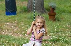 swing girl sitting young rope shoe photoshelter pink socks outside play lang rob family