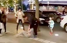 wife cheating chinese man girl shocking china her his street gets their beats crying while away floor mother into beat