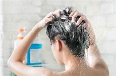 hair shower bath washing woman clogs dealing tools shutterstock her