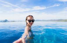 swimming pool asian woman leisure relax smile resort hotel around happy young portrait beautiful