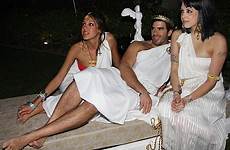 toga party roman debauchery peaches couple eli roth event outdoor bed after drug geldof starts