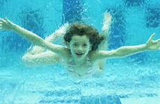 swimming girl underwater pool dissolve stock d984 photoalto