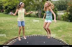 trampoline girls jumping stock teenage alamy