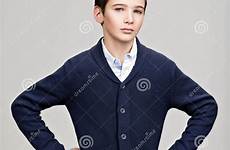 confident teenage boy studio posing preview