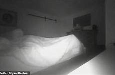 man ghost bed his webcam paranormal pulling filmed he phenomenon bedroom haunts sheets head sits after someone sitting recorded seen