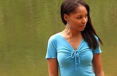 girl teen beautiful american african posing lake stock post