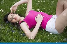 laying down woman dress young grassland attractive casual looking preview