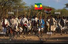 oromo ethiopia tribe walking alamy stock flag men group