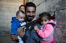 family refugee syrian unhcr father struggle face story survival jun feature