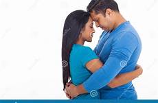 indian couple hugging loving stock eyes closed young background