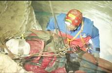 trapped climber ordeal rescuers rescued injured