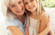 grandmother granddaughter relaxing together preview