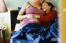 son bed mother talking alamy stock