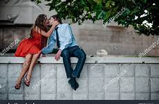 kissing couple outdoors park teen shutterstock stock search