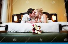bedroom romantic kiss groom bride happy stock hotel