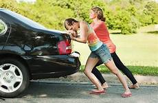 pushing car women forward road stock travelers problem young their