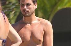 disick hands himself shirtless caught lord huffpost adjusts exactly ididafunny kourtney daddy