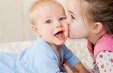 sister brother big baby her stock little moment between sweet kissing older kisses looking search cute shutterstock cheek delight camera