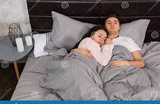 bed couple sleeping hugging other young each while attractive portrait bedroom dreamstime embracing preview