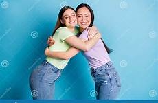 hugging buddies profile overjoyed cheerful lesbians closed couple students eyes friends young two people preview