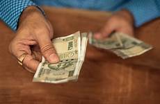 rupee gst mandatory liability banknotes bunch hundred indiatvnews bribery