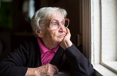 elderly window woman glasses looking thoughtfully staring care categories
