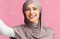 hijab cheerful sincerely laughing