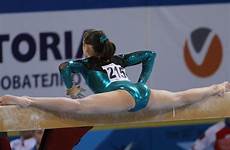 gymnast gymnastics beam performing rhythmic tumbling