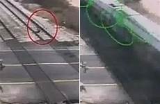 survives surviving attempt cctv oncoming miraculously throws captures herself