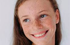 freckles girl portrait hair smiling long attractive stocksy liliya united