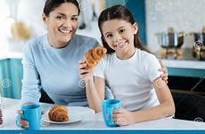 daughter cheerful lunch having mother together