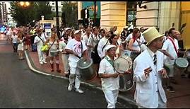 Derek Rieth of Pink Martini's memorial drum parade