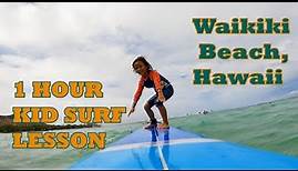 Kid Surfing Lesson with Kahu Surf School Hawaii Waikiki Beach