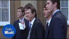 Ferry with Merlin and other sons as he got his CBE in 2011 - Daily Mail