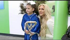 Flair shares a special moment with a young fan: Charlotte Flair A&E Biography: Legends sneak peek