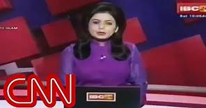 News anchor reports husband's death