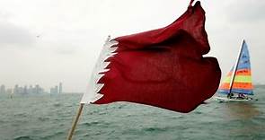 ¿Qué simboliza la bandera de Qatar?